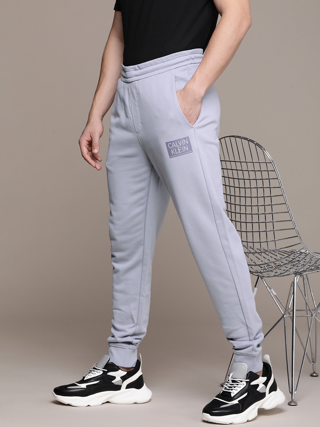 Buy CALVIN KLEIN JEANS Solid Cotton Regular Fit Mens Track Pants | Shoppers  Stop