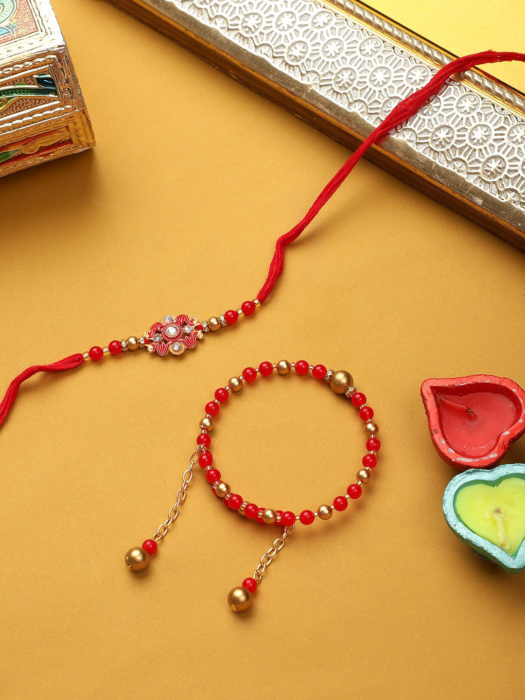 Mali Fionna Set Of 2 Stone Studded Rakhis With Diya