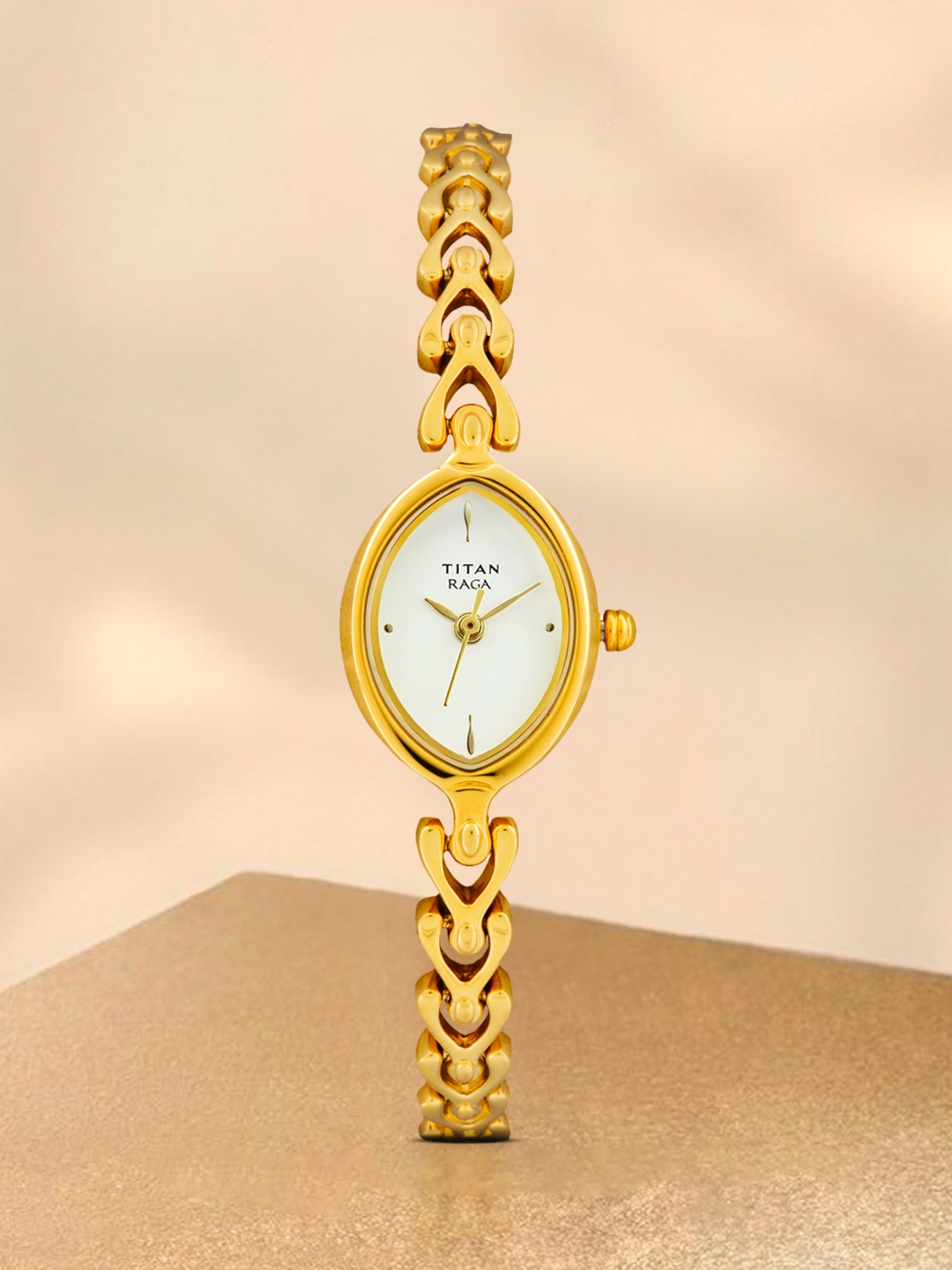 Titan raga gold 2025 plated ladies watches