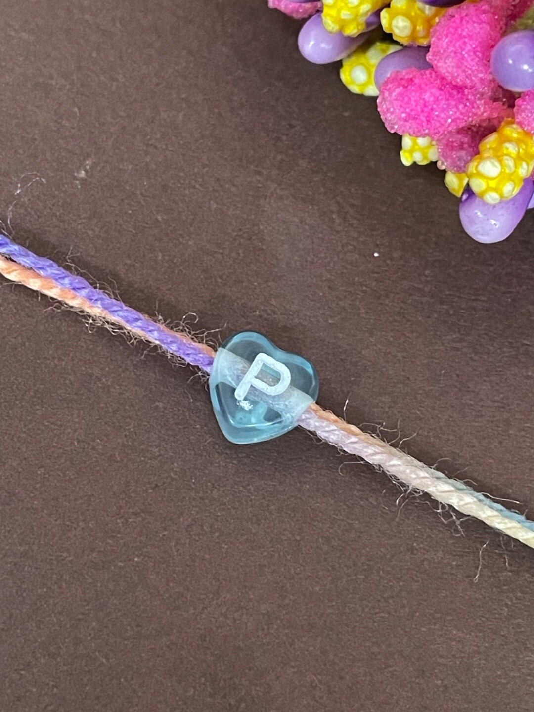 Digital Dress Room P Alphabet Charm Detail Rakhi