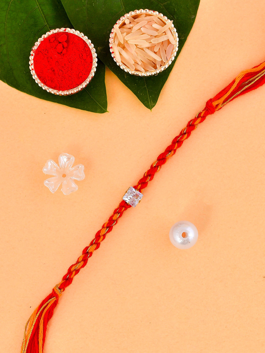 Aapno Rajasthan Unisex CZ-Studded Square Charm Beaded Rakhi With Roli Chawal & Card