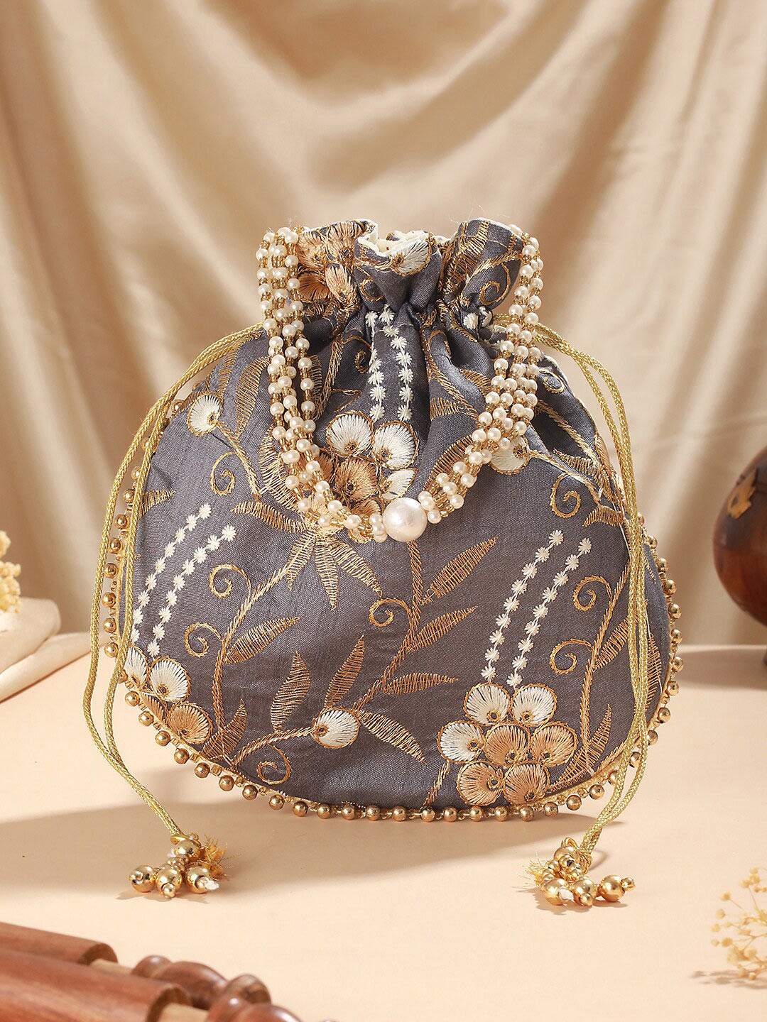 Jazz and Sizzle Embroidered Potli Clutch