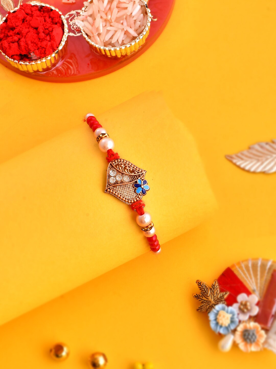 Aapno Rajasthan Jaali Cutwork & Stone Embellished Scarlet Rakhi