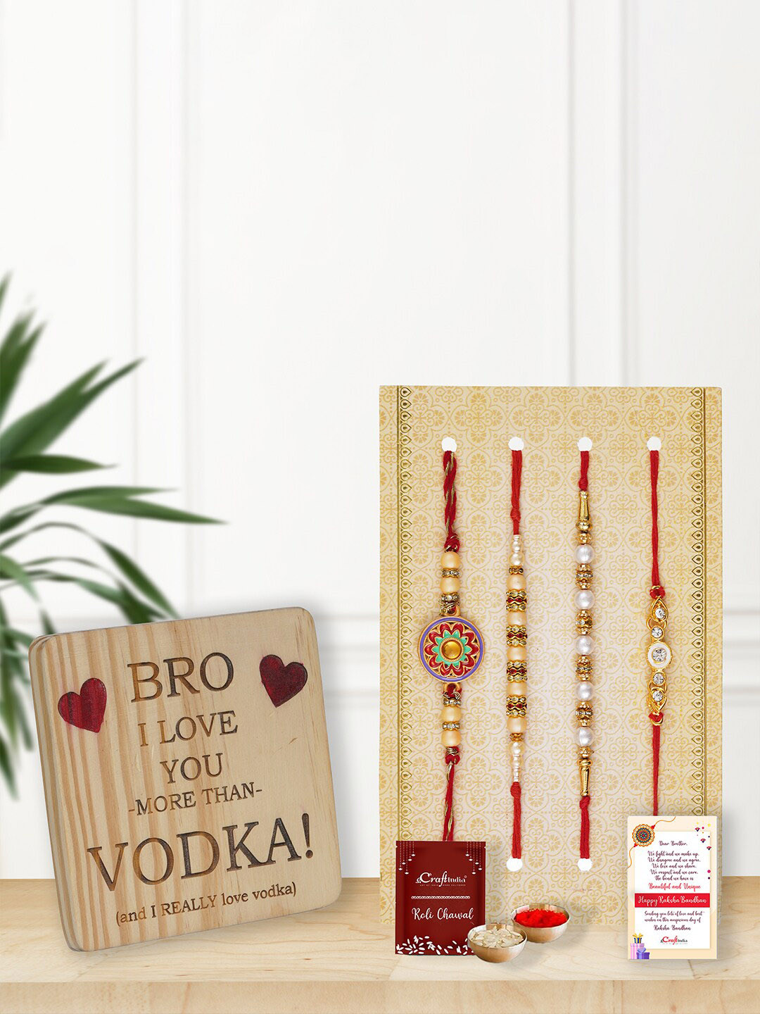 eCraftIndia Set of 4 Rakhi with Roli Chawal & Showpiece Greeting Card Gift Set