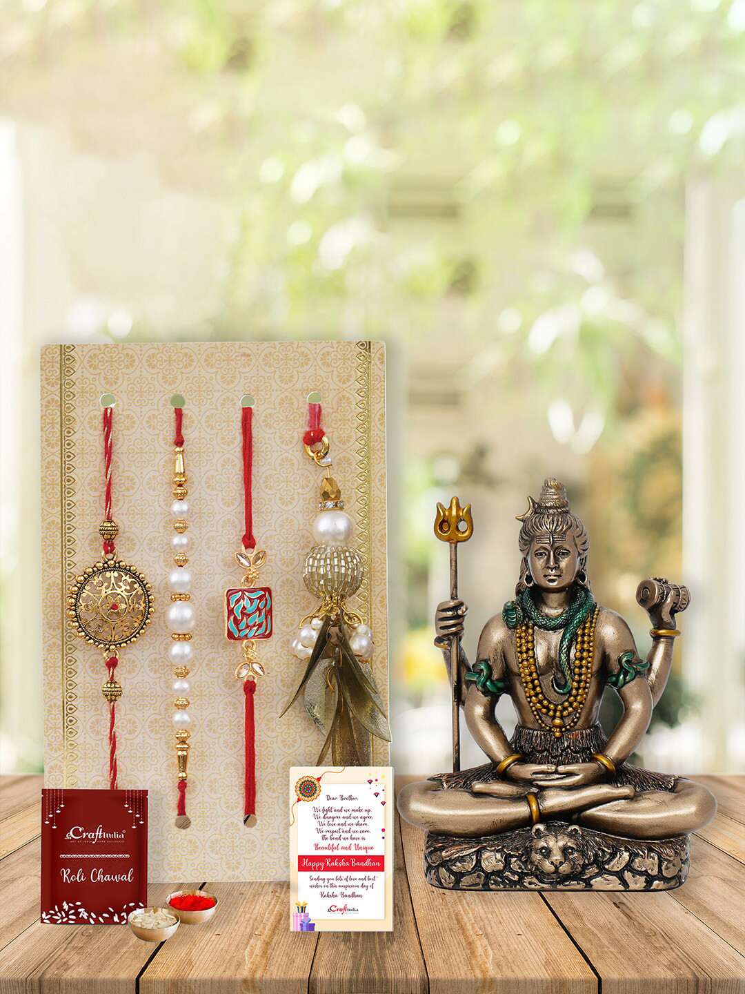 eCraftIndia Set of 4 Rakhis with Lord Shiva Statue, Roli Chawal & Greeting Card