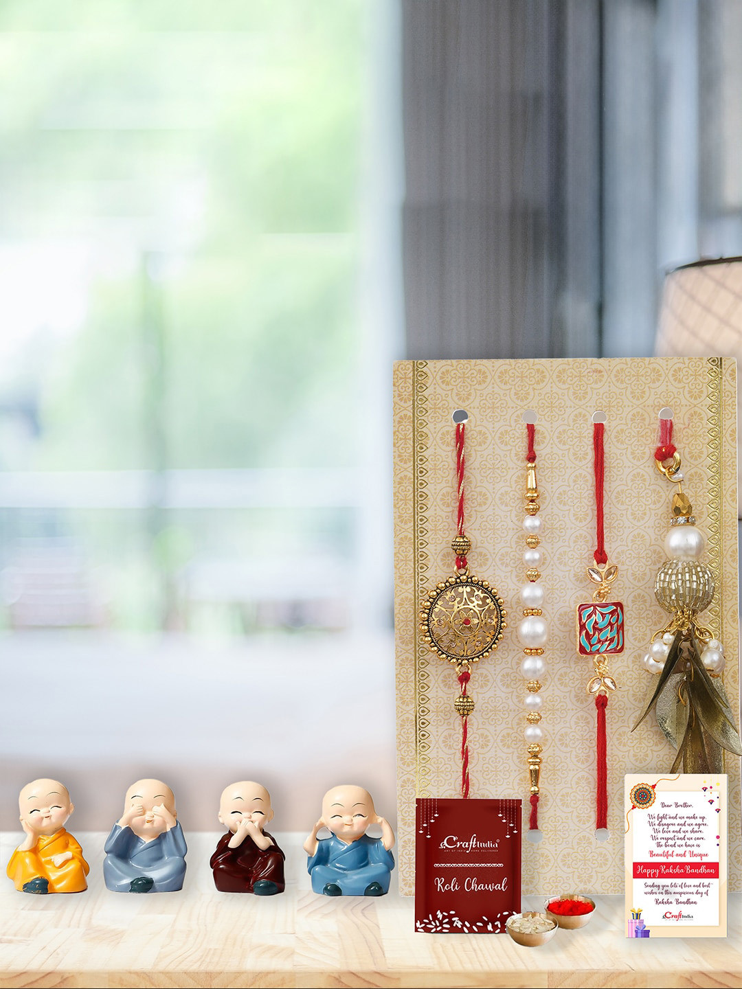eCraftIndia Unisex Set of 4 Rakhis With Buddhas Statue, Roli Chawal & Greeting Card