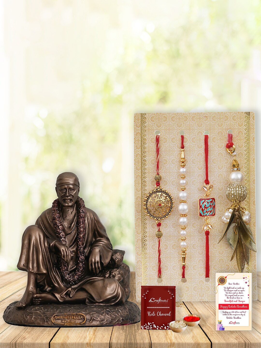 eCraftIndia Set of 4 Lumbas & Rakhis with Sai Baba Statue