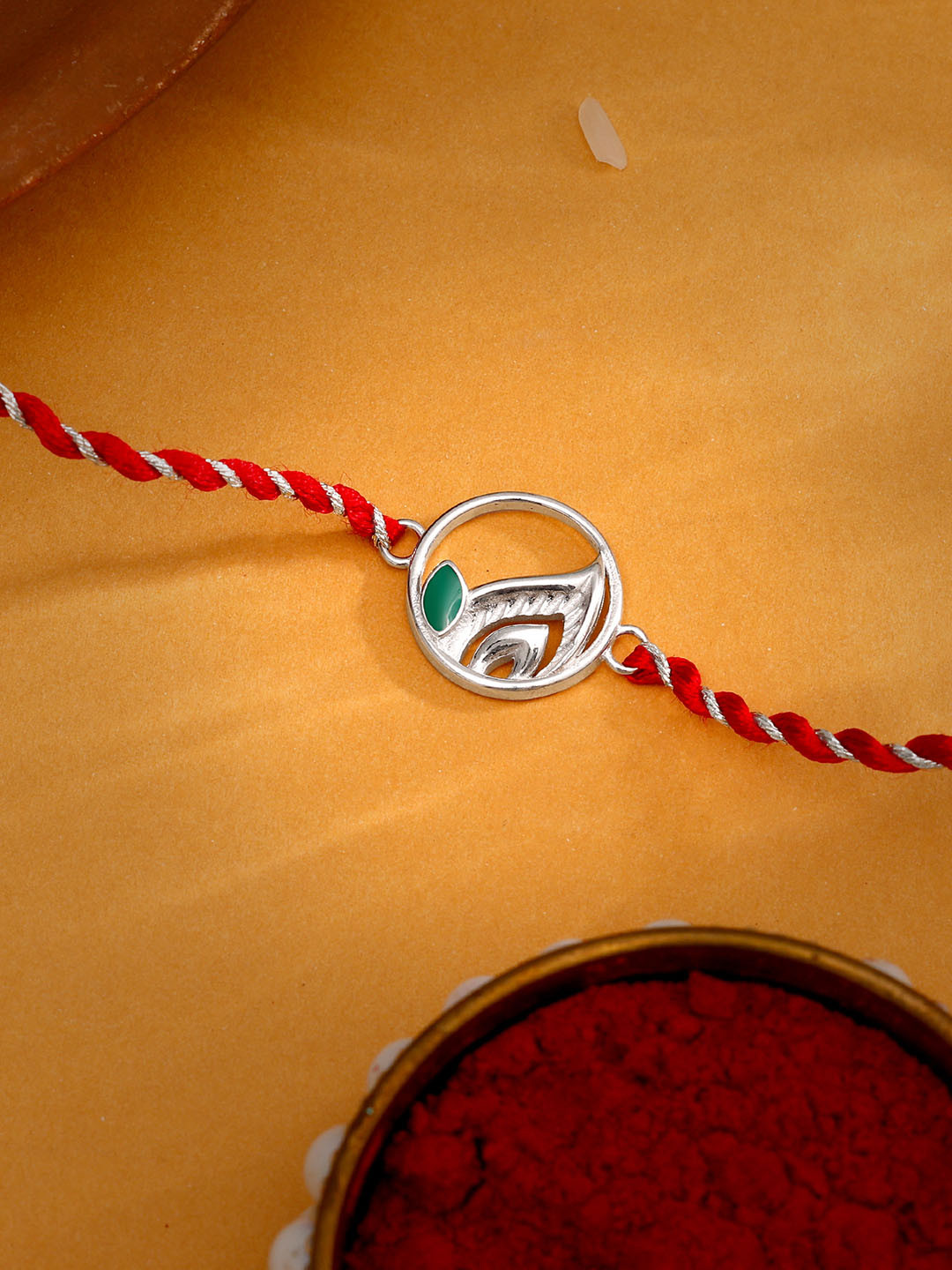 GIVA 925 Sterling Silver Peacock Feather Rakhi with Roli Chawal