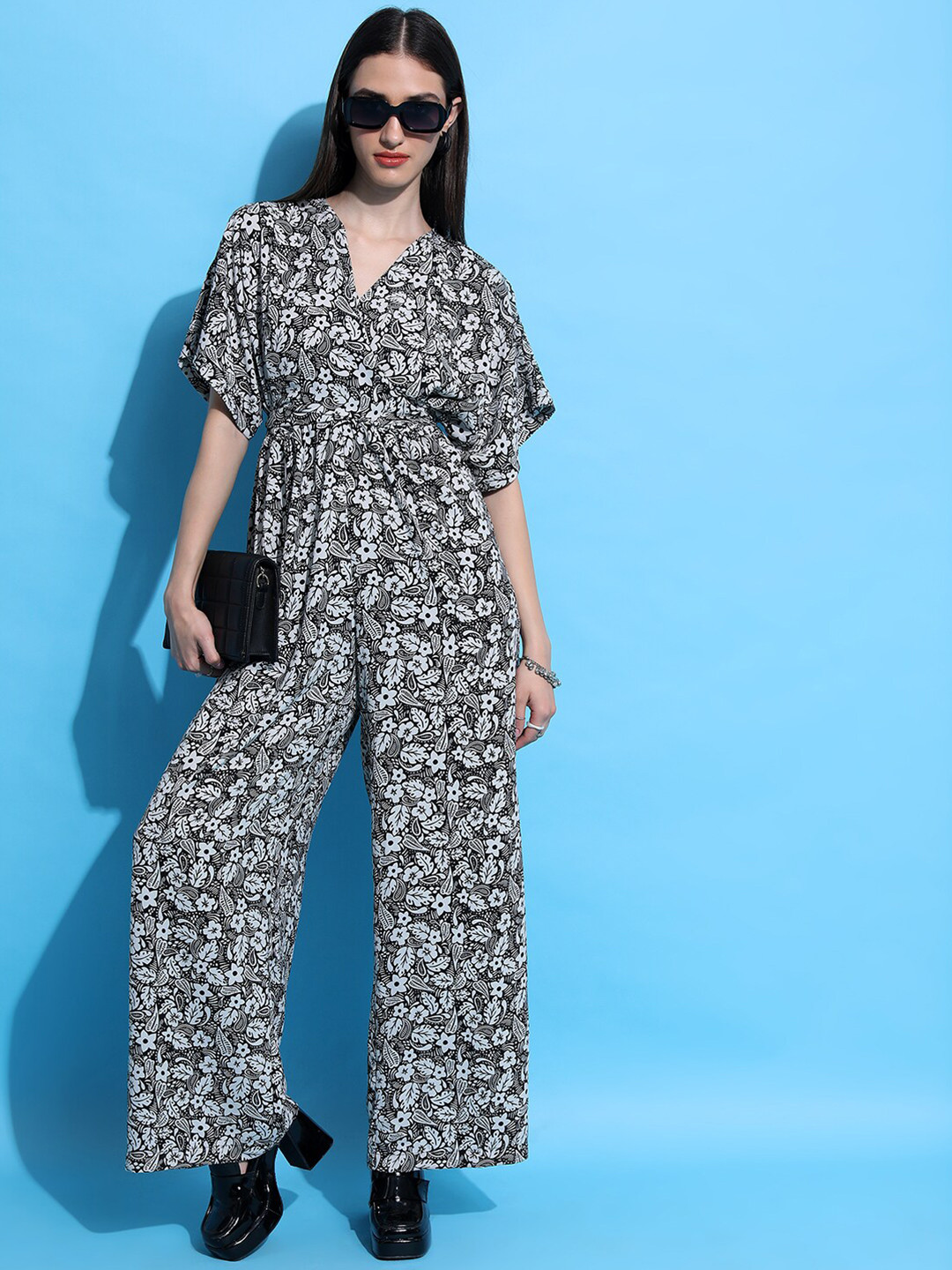 Tokyo Talkies Black & Off White Floral Printed V-Neck Front Twisted Basic Jumpsuit