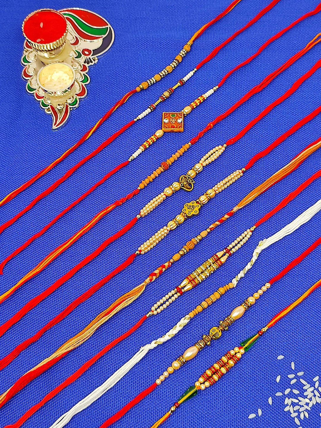 CRAYTON Set Of 11 Beaded Rakhi With Roli Chaval Box & Plate