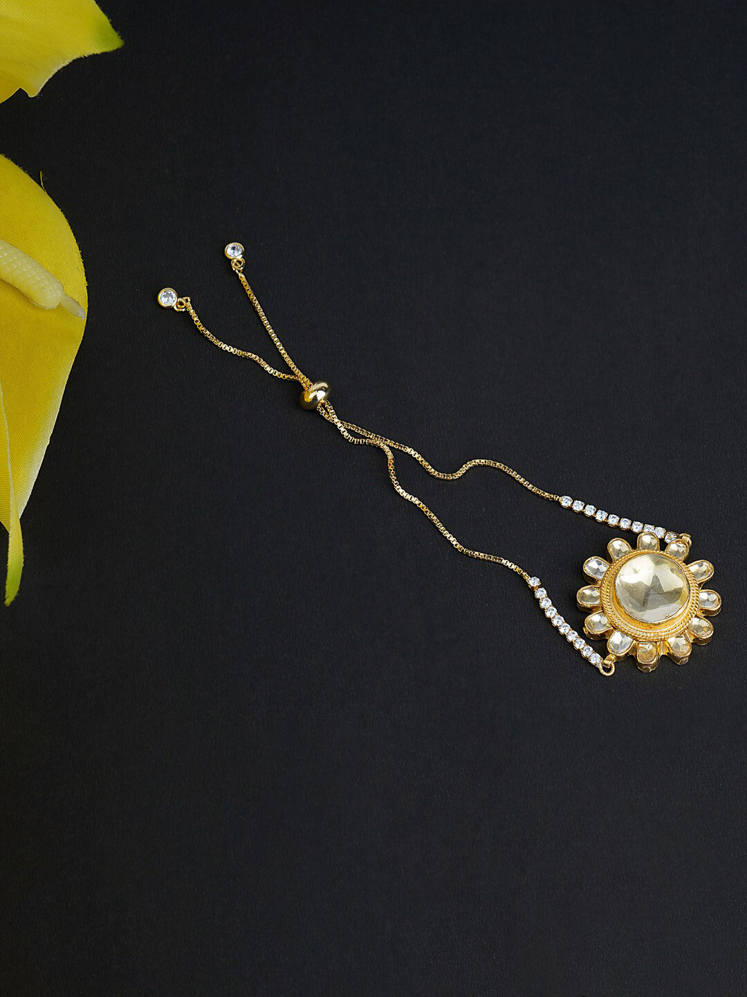 AURAA TRENDS Women 22KT Gold-Plated Kundan Classic Rakhi Bracelet