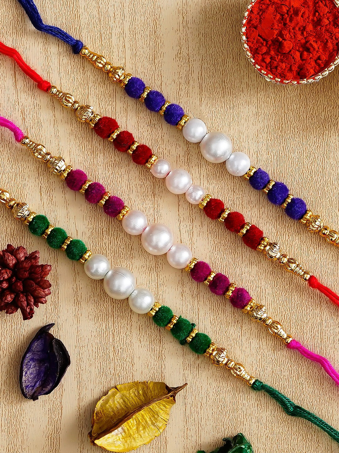 eCraftIndia Unisex Set of 4 Thread Rakhis With Roli Chawal Pack