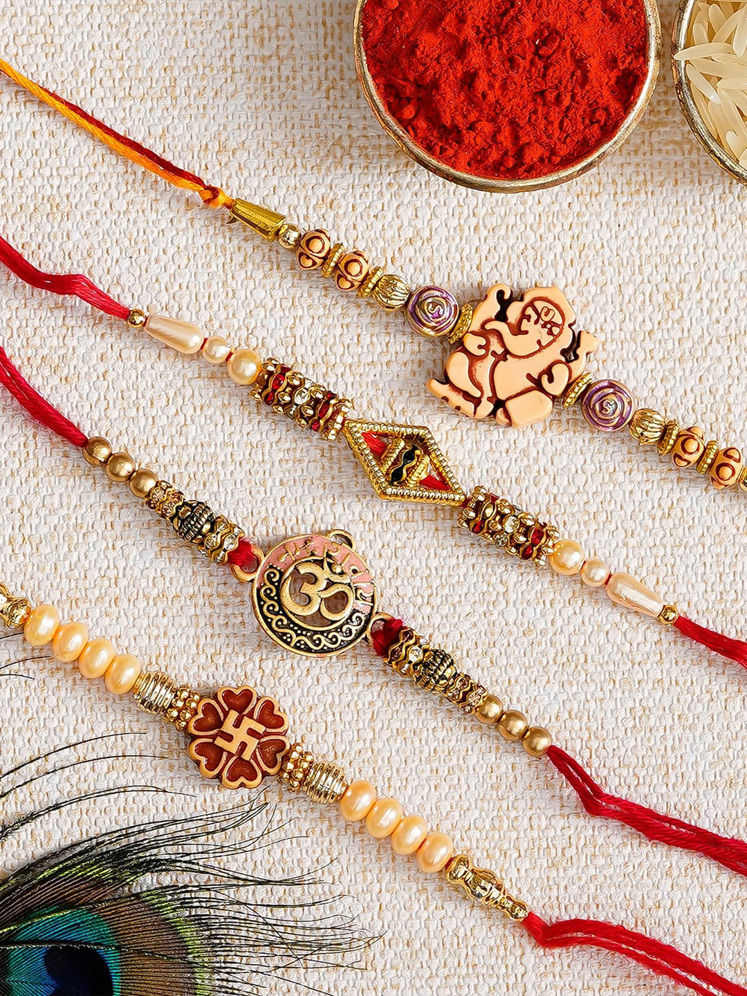 eCraftIndia Set of 4 Rakhi Gift Set with Roli Chawal Pack