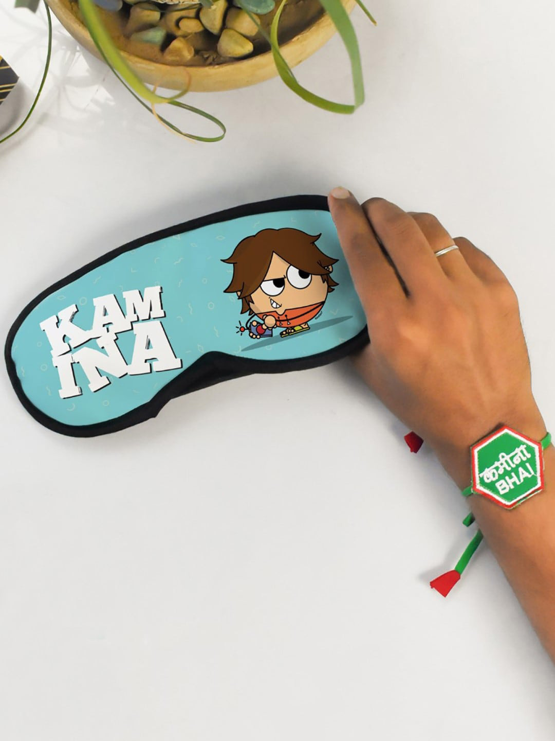 Indigifts Embroidery Rakhi with Printed Eye Mask Gift Set