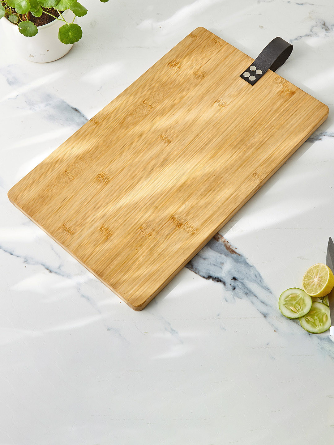 Home Centre Brown Bamboo Chopping Board With Leather Handle