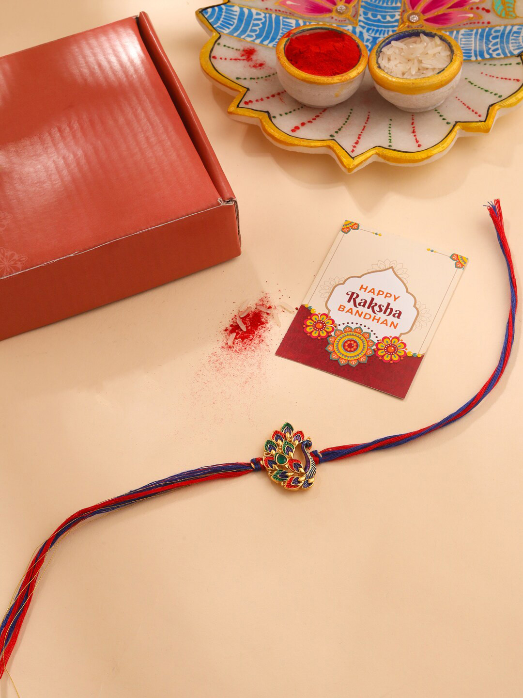 Natures Buggy Men Gold Plated Peacock Rakhi With Roli & Chawal