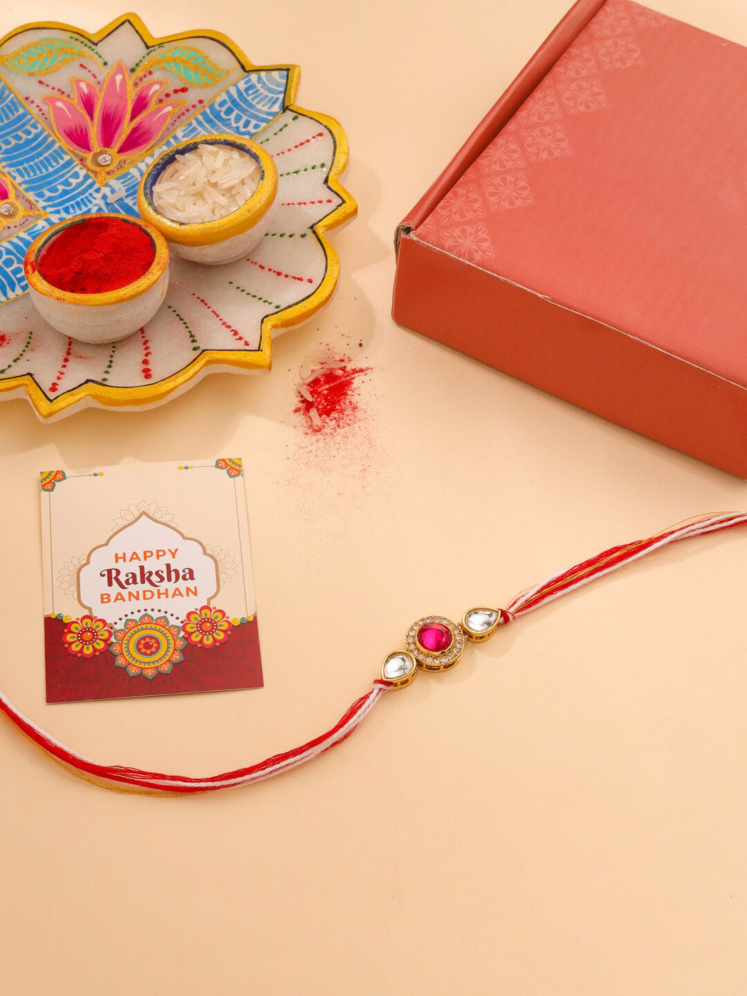 Natures Buggy Men Kundan Studded Rakhi with Roli & Rice