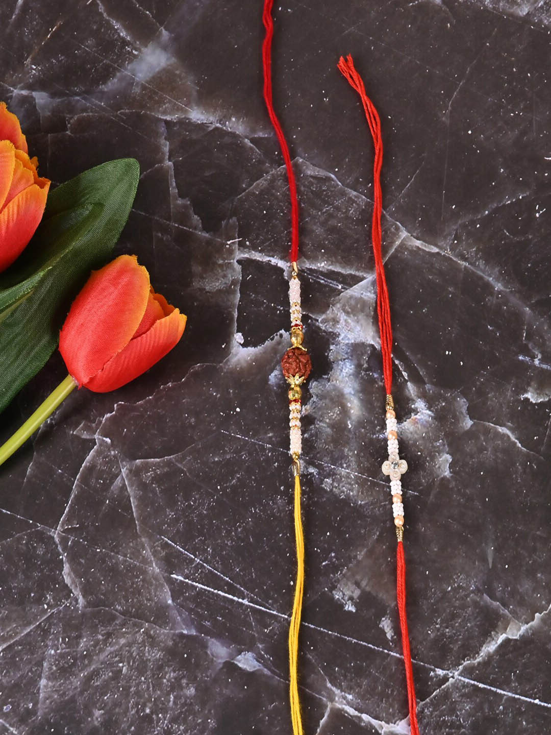 Jewelz Set Of 2 Pearl Beaded Rudraksha & Flower Charm Rakhi