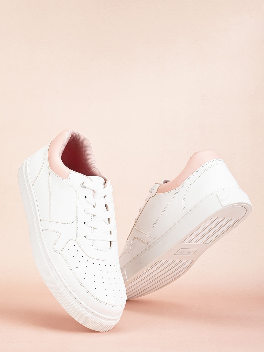 White sneakers with hot sale pink soles