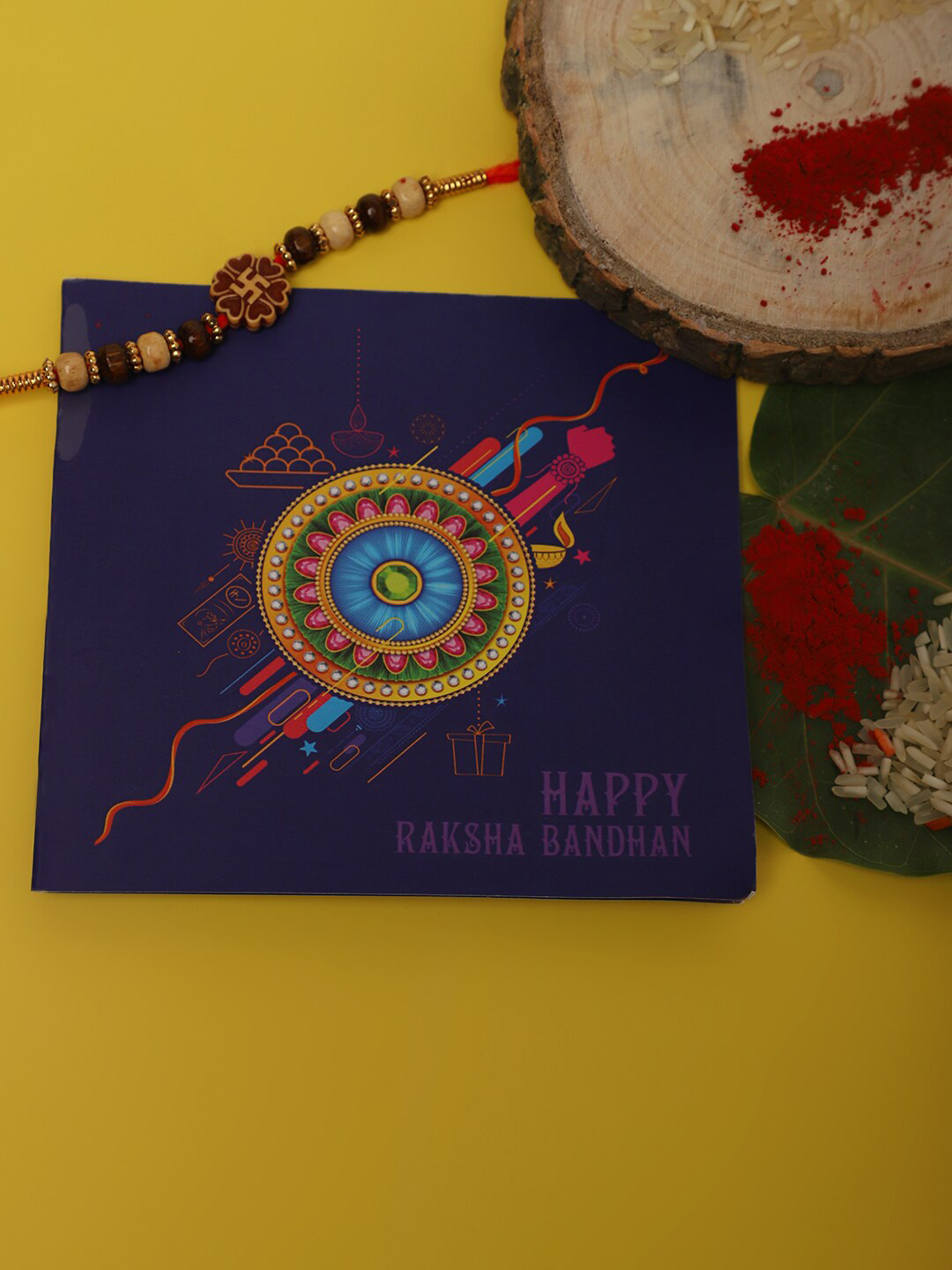 Anouk Unisex Red Swastik Charm & Beaded Rakhi With Roli Chawal & Greetings Card