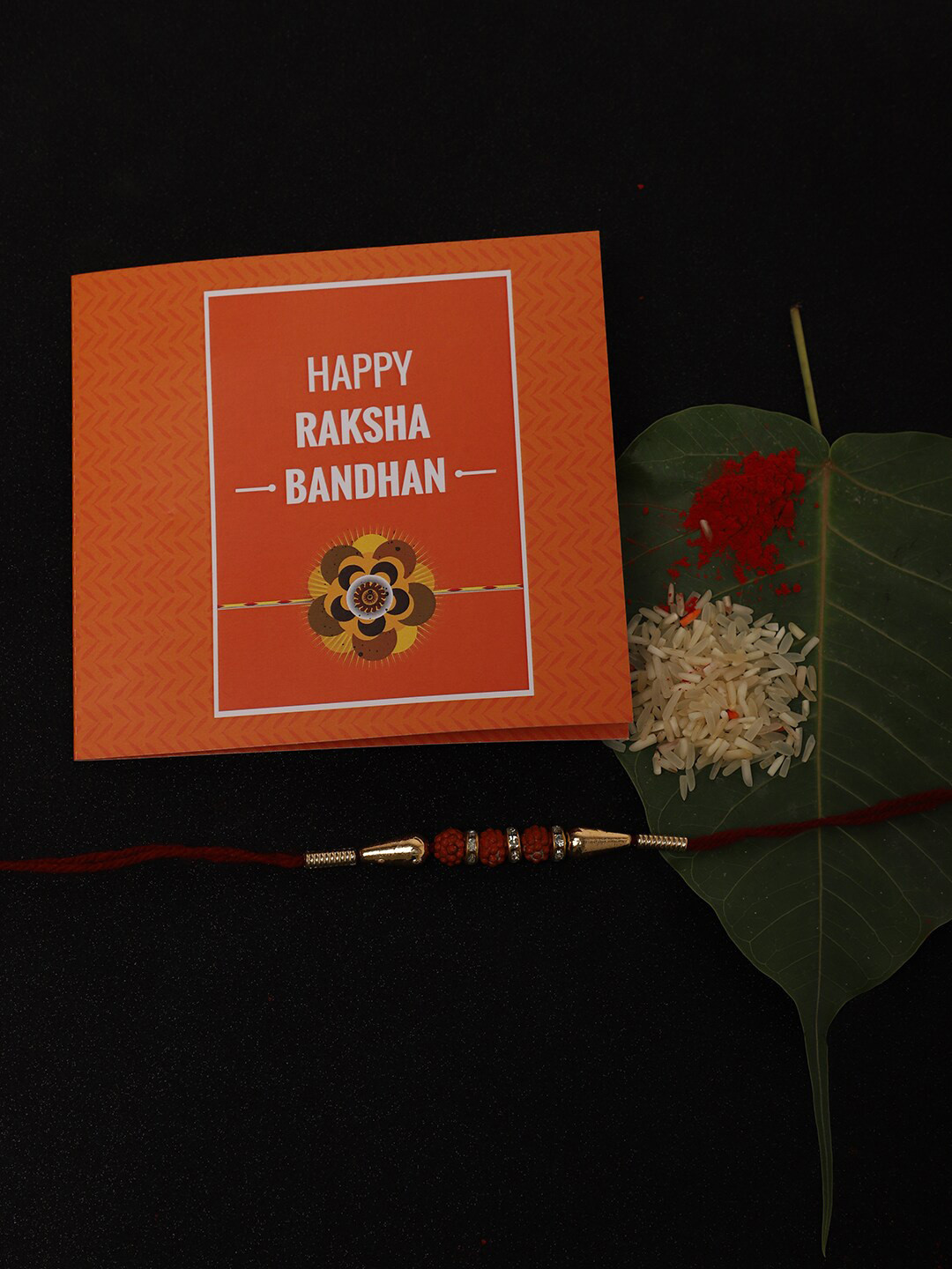Anouk Unisex Rakhi with Card And Roli Chawal