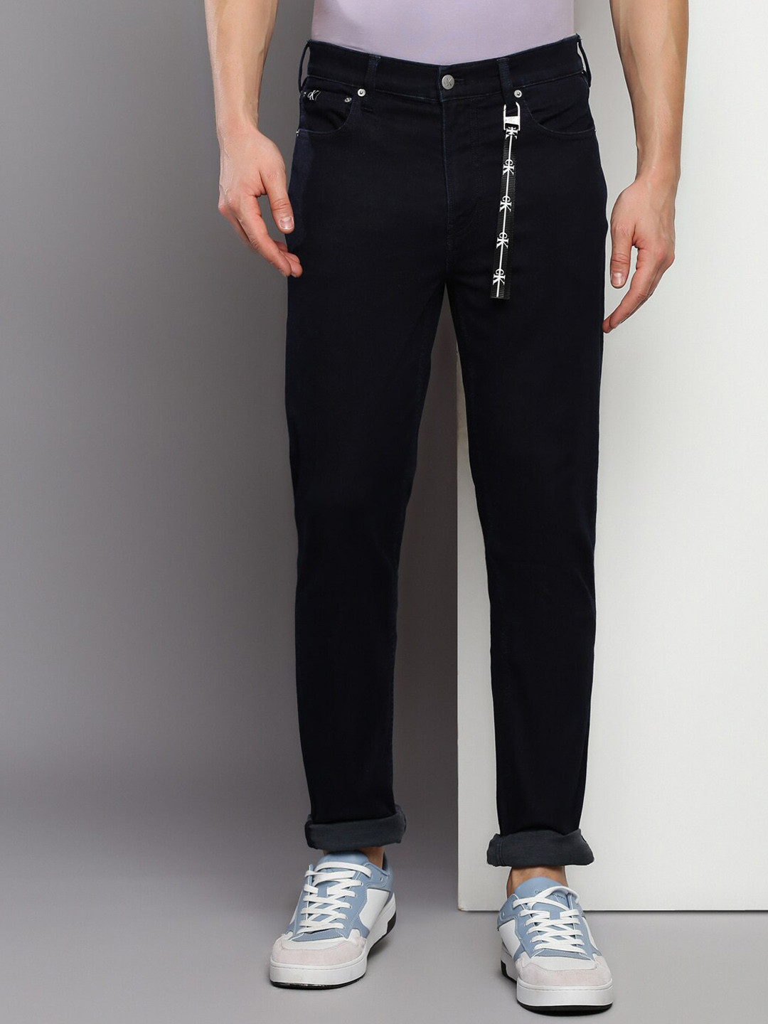 Calvin Klein Jeans Men Slim Fit Mid Rise Dark Shade Clean Look Cotton Jeans