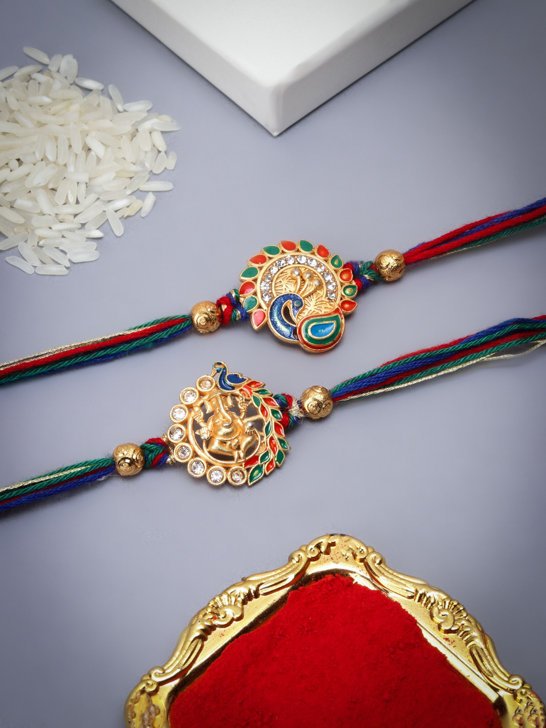 The Purple Tree Men Set Of 2 Stone-Studded Peacock Charm Rakhis