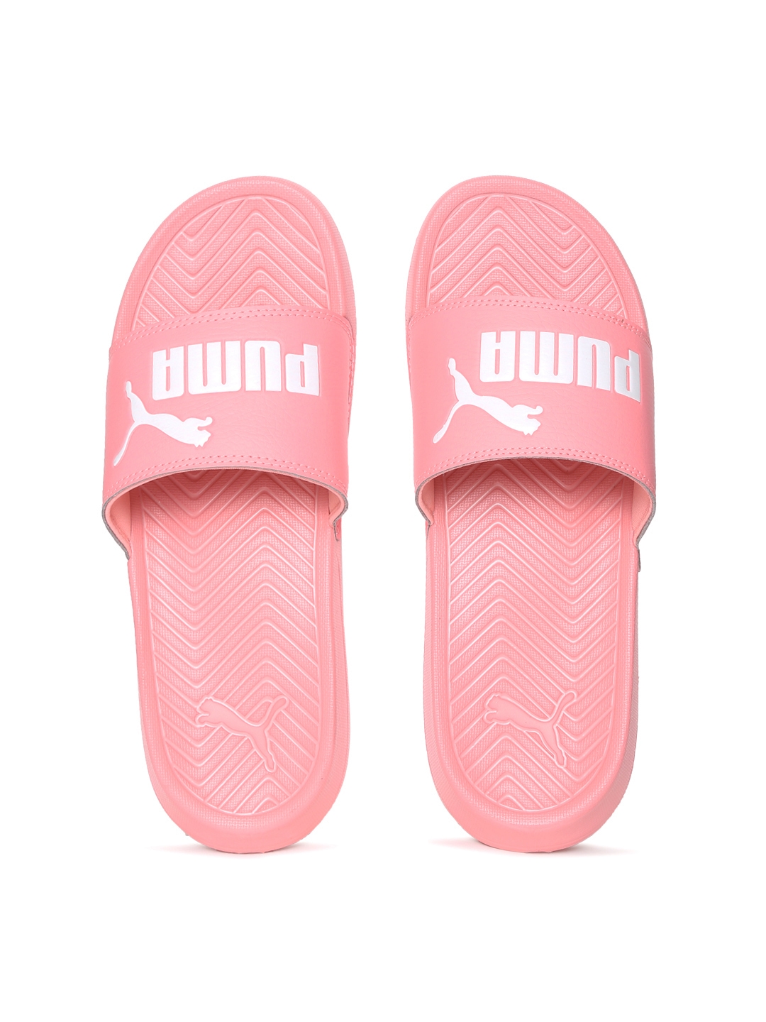 light pink puma slides