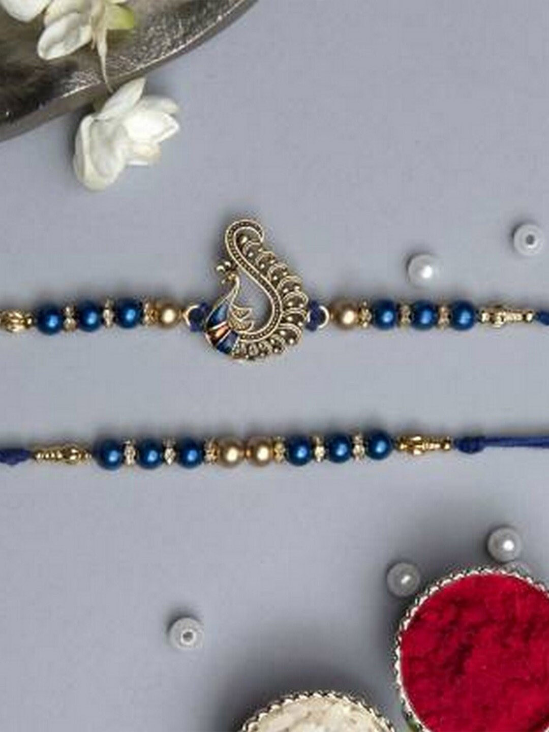eCraftIndia Set of 2 Om Symbol and Pearl Designer Rakhi Gift Set