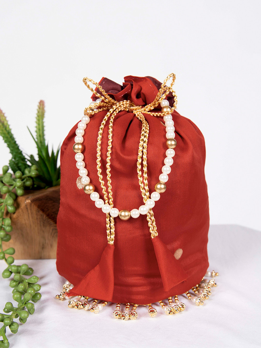 LOOKNBOOK ART Embellished Tasselled Potli Clutch