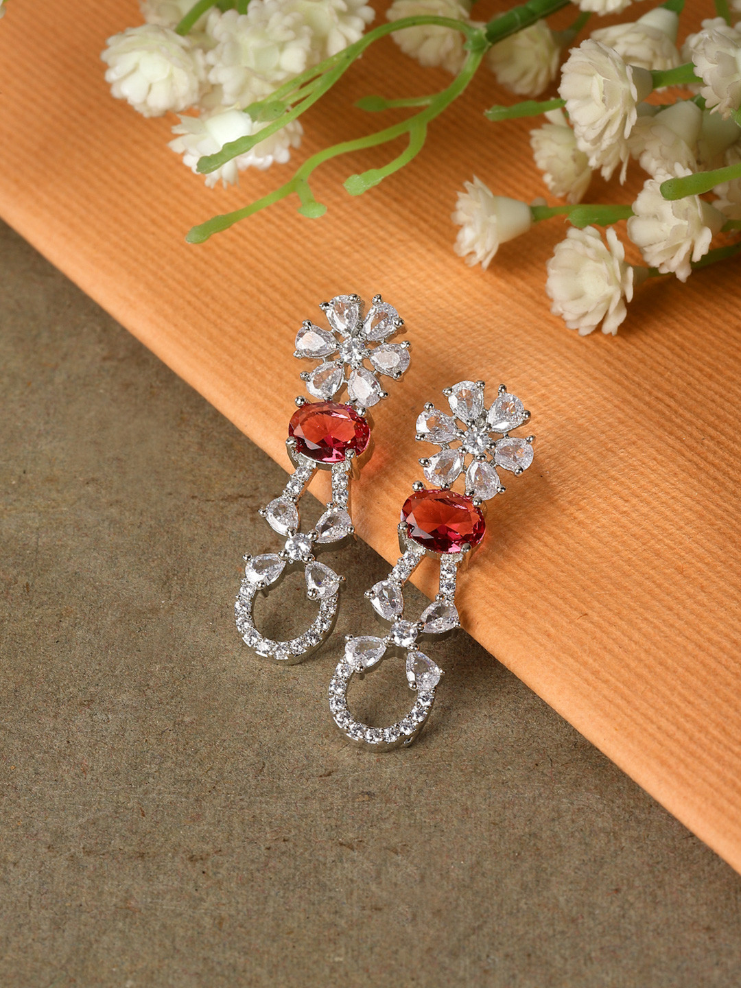 Rhodium Plated Floral Shaped Red American Diamond Studded Drop Earrings