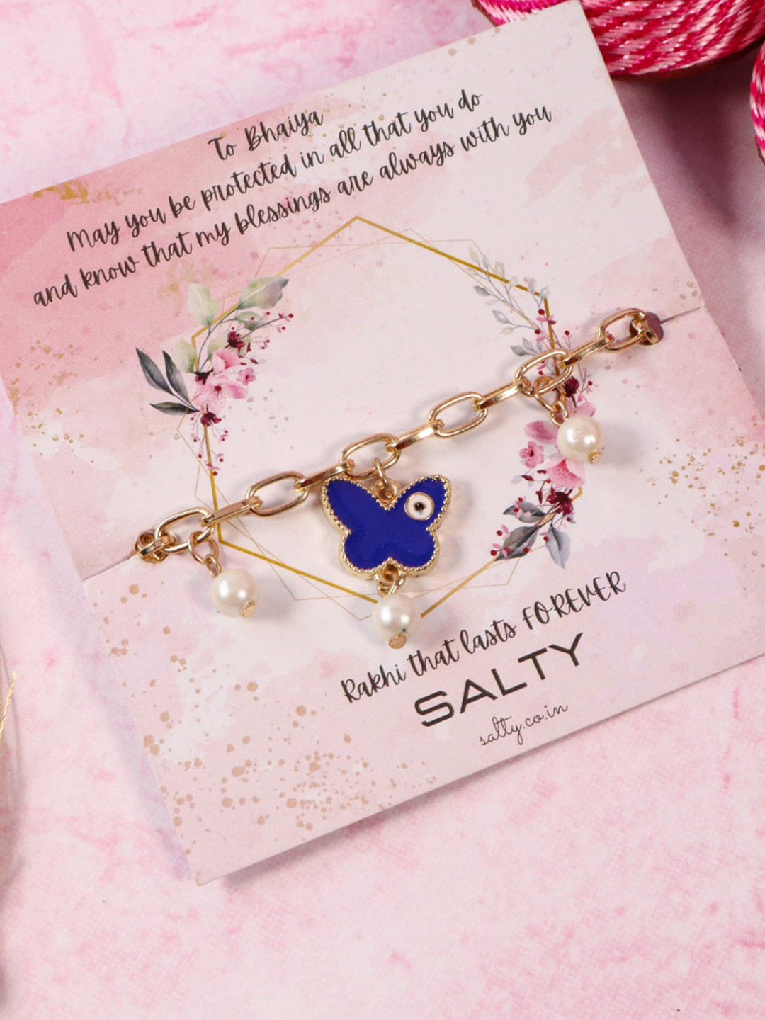 SALTY Women Butterfly Painted Evil Eye Beaded Rakhi