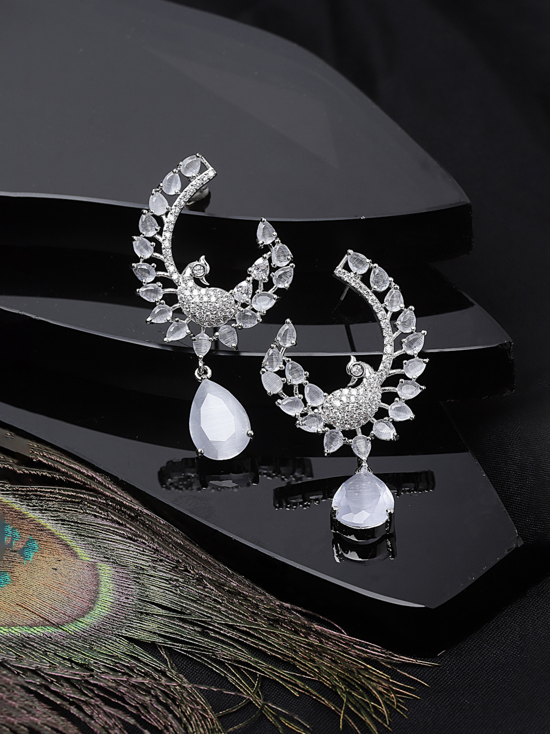 ZENEME Rhodium-Plated American Diamond Studded Feather Shaped Drop Earrings
