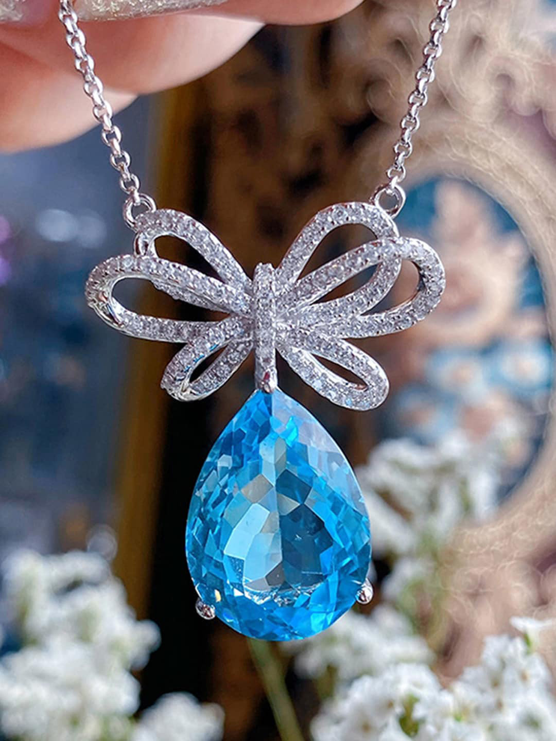 Designs & You Silver-Plated AD-Studded & Ice Cut Blue Teardrop Shape Pendant With Chain