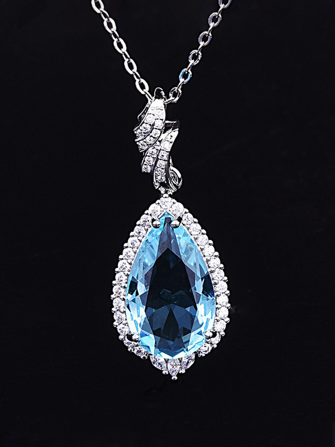 Designs & You Silver-Plated AD-Studded & Ice Cut Blue Teardrop Shape Pendant With Chain