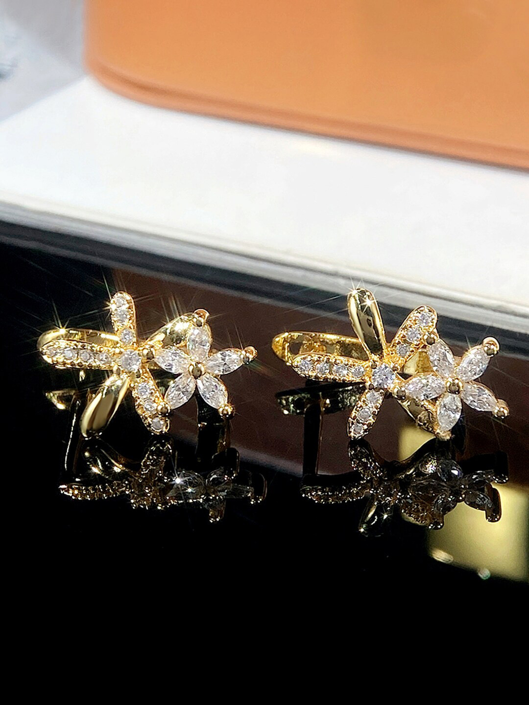 Designs & You Gold Plated American Diamond Star Shaped Studs Earrings