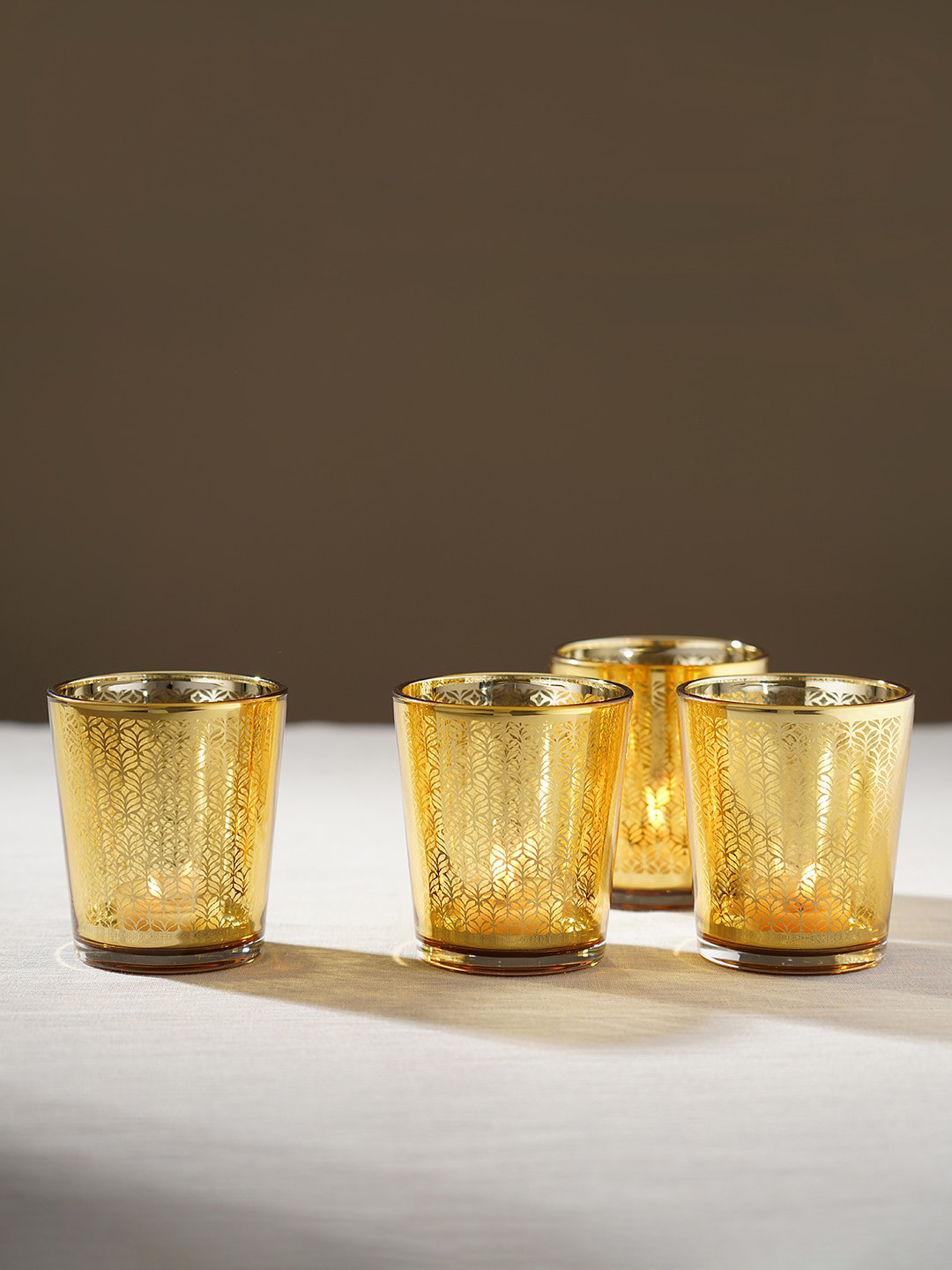 Pure Home and Living Beige 4-Pieces Cut Patterned Glass Candle Holders