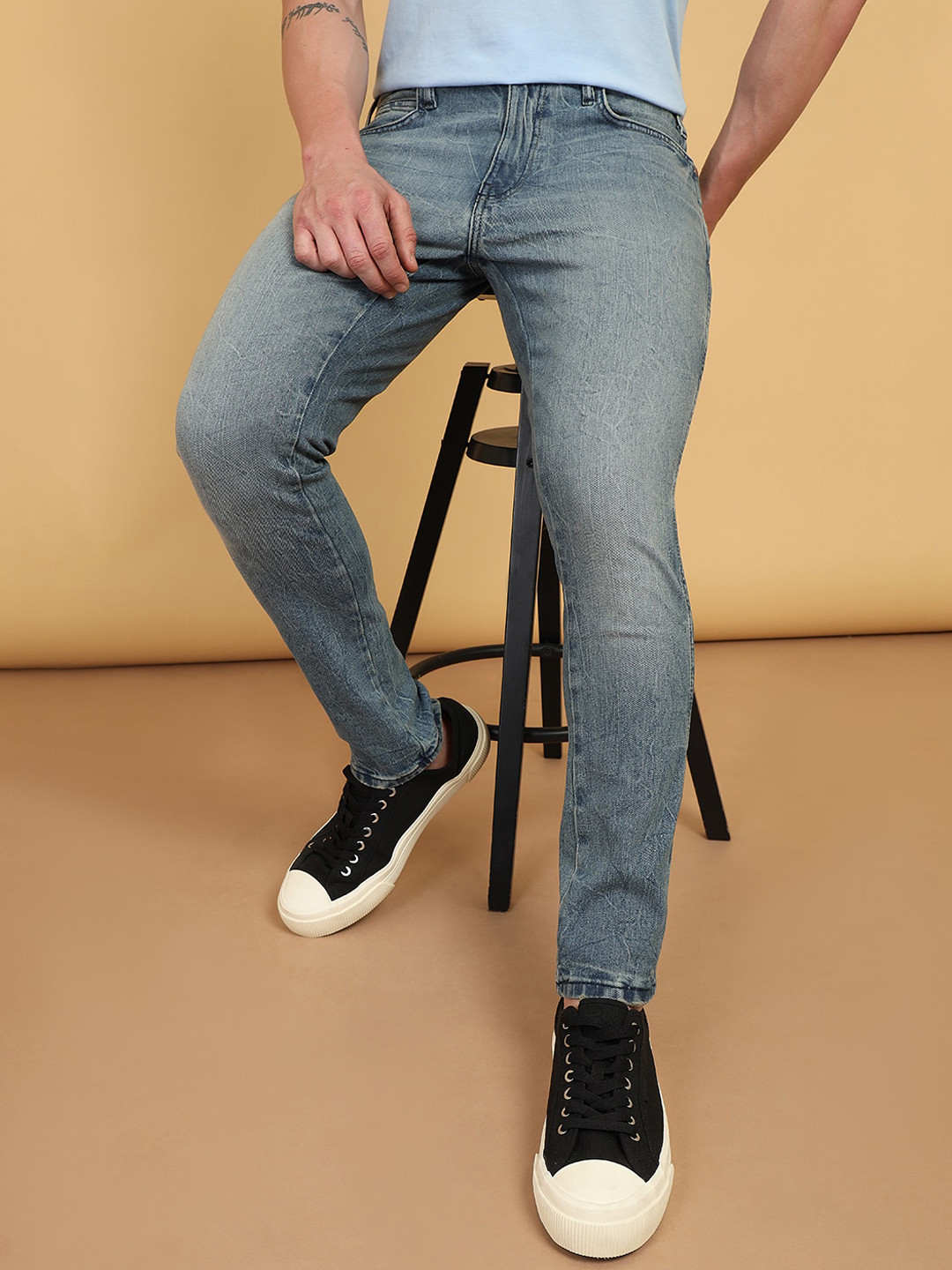 Wrangler Men Slim Fit Mid-Rise Light Shade Heavy Fade Clean Look Stretchable Jeans