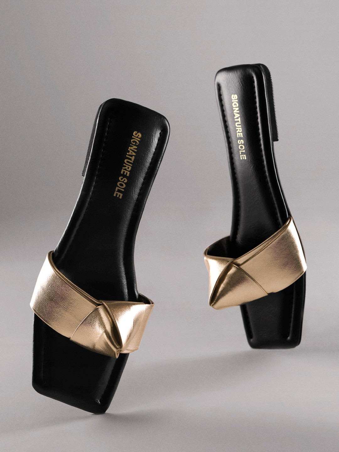 Signature Sole Knotted Strap Open Toe Flats