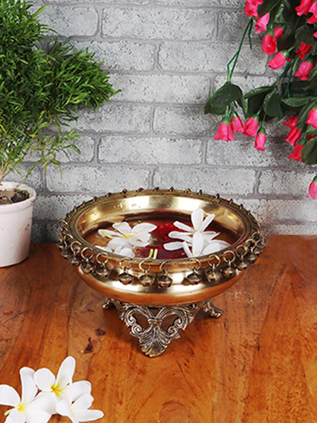 Two Moustaches Gold Toned Brass Urli Bowl on Ethnic Carved Legs