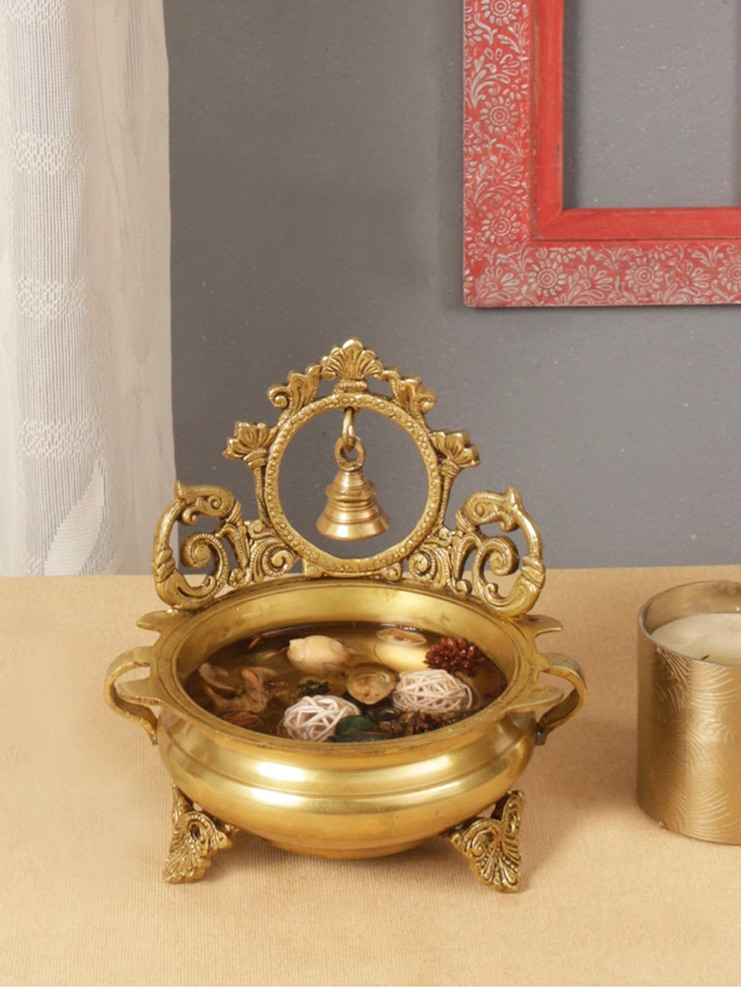 Two Moustaches Gold-Toned Ethnic Indian Carved Urli Decorative Bowl With Bell