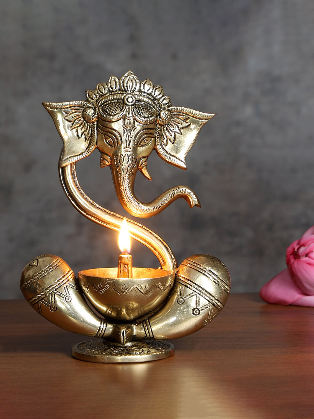 Two Moustaches Gold Toned Ganesha With Diya on Lap