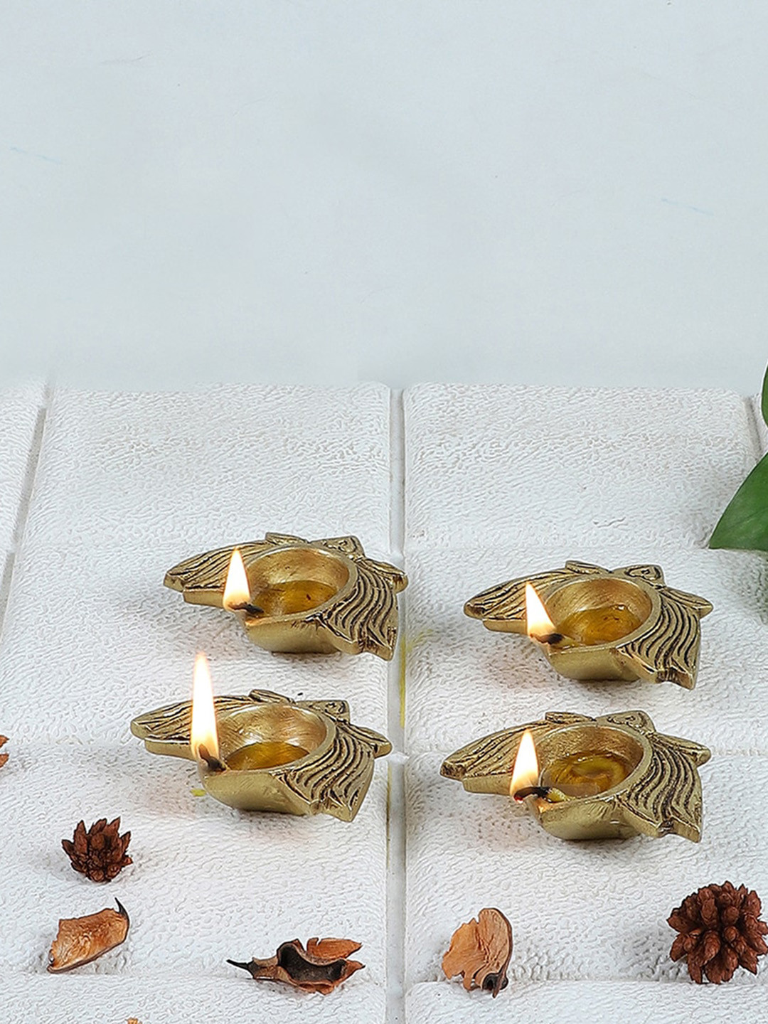 Two Moustaches Beige 4 Pieces Lotus Shaped Decor Brass Diyas