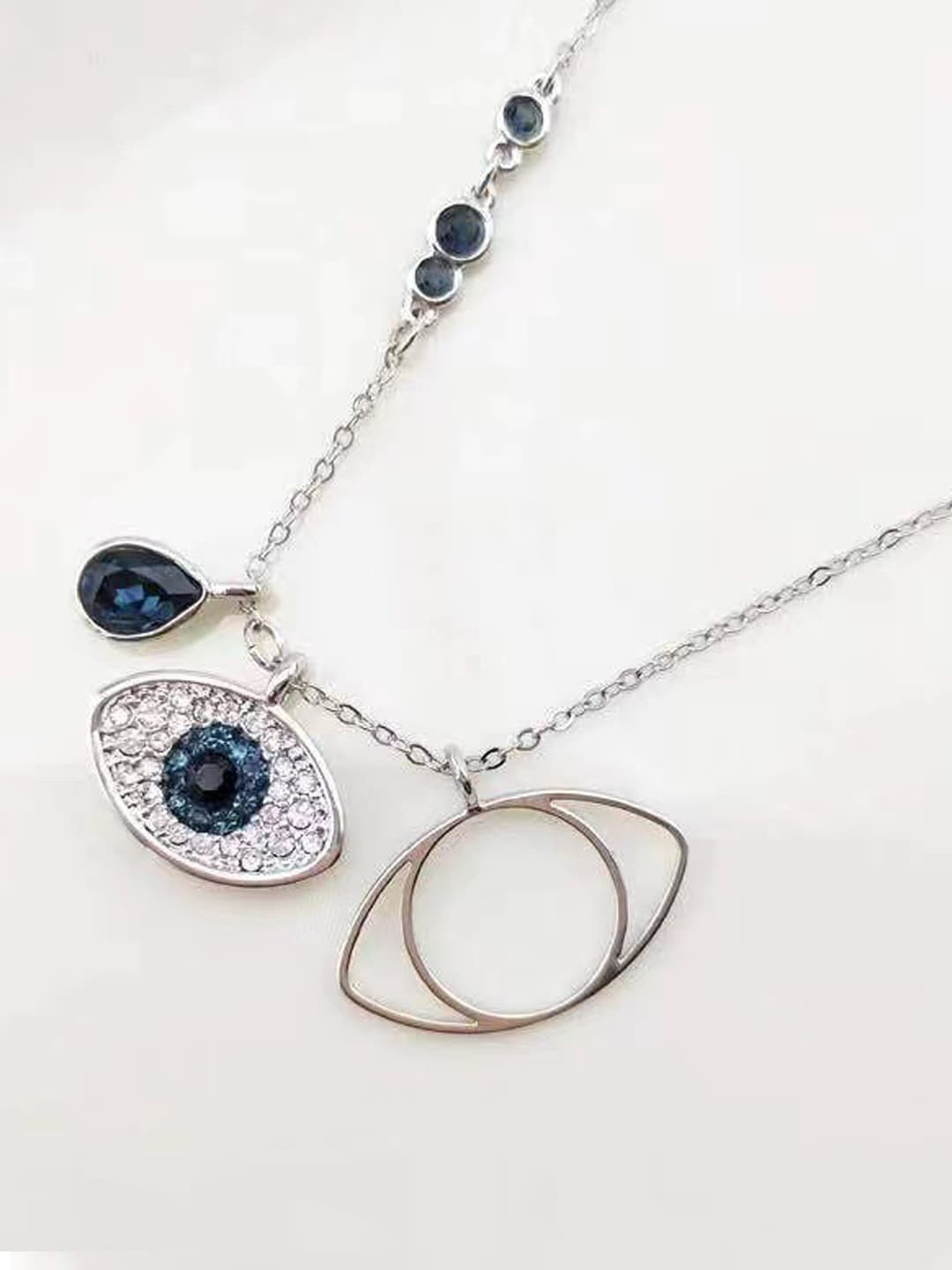 Designs & You Silver-Plated American Diamond Studded Pendant With Chain