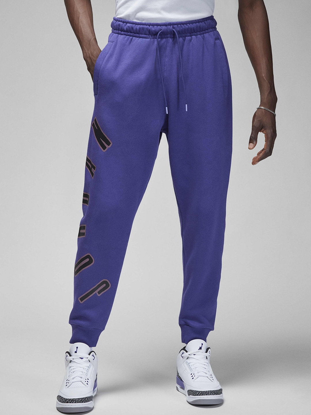 Purple jordan sweatpants shop