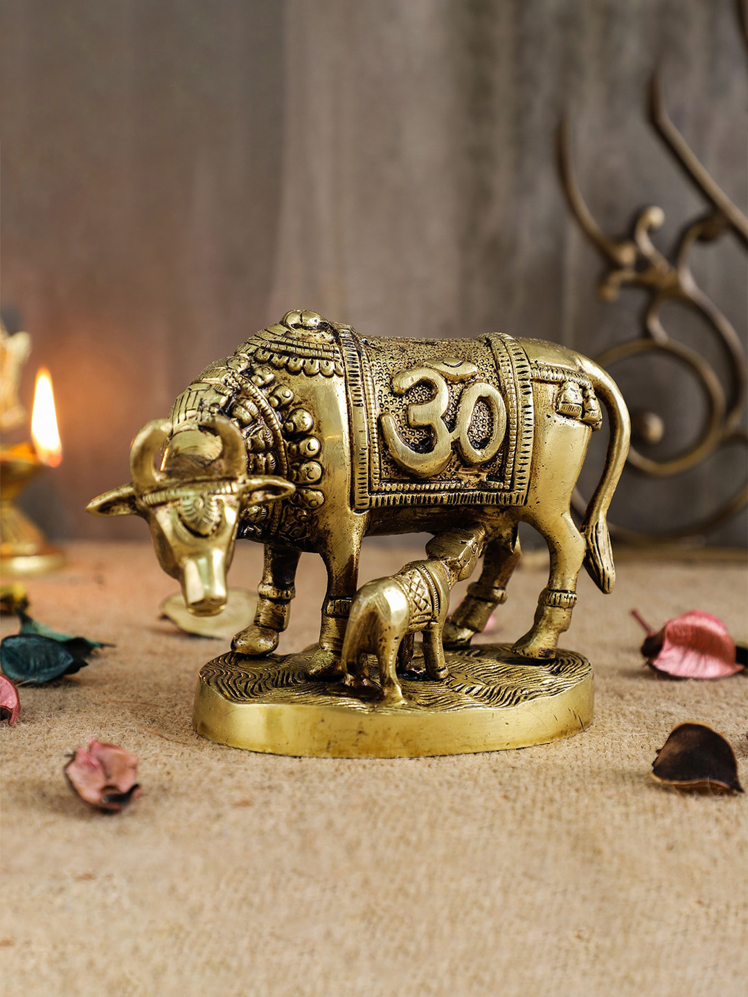 Two Moustaches Om and Swastika Engraved Kamdhenu Cow Gold Brass Metallic Living Room Small Showpiece - 3.9 Inches