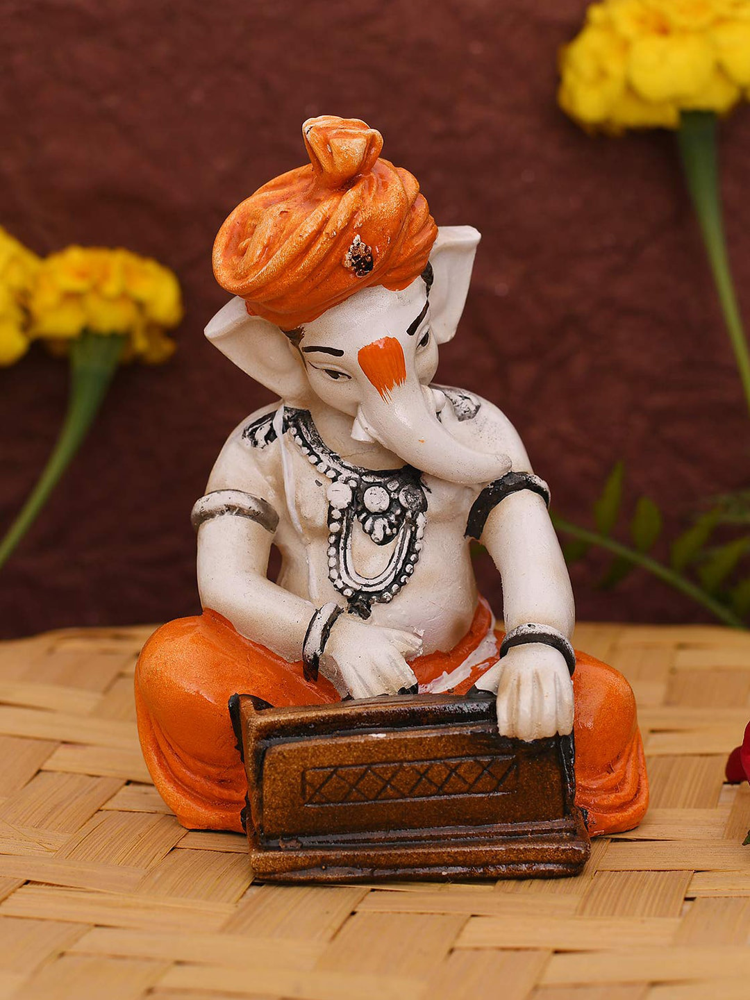 CraftVatika Dancing Ganesh with Hanging Bells Beige Polyresin Glossy Living Room Small Showpiece - 3 Inches