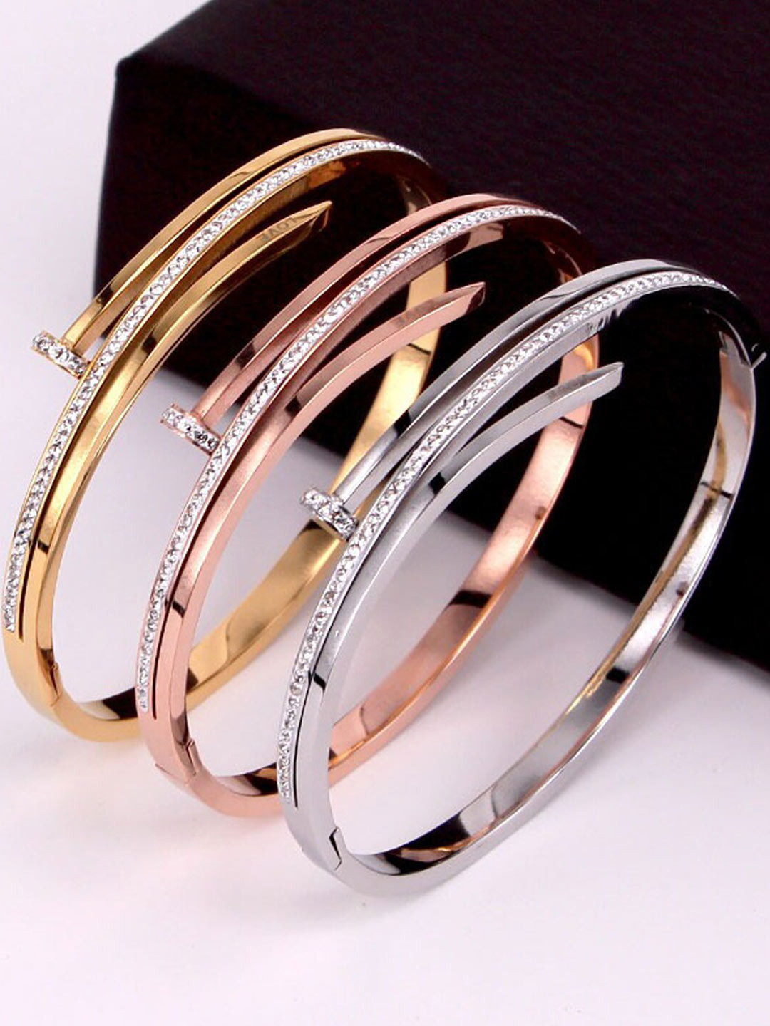 Jewels Galaxy Set Of 3 Gold, Rose Gold and Silver Plated Stainless Steel AD Bracelets