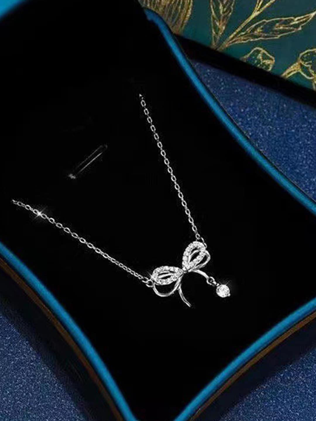 Jewels Galaxy Silver-Plated AD Stone Studded Infinity Shape Pendant