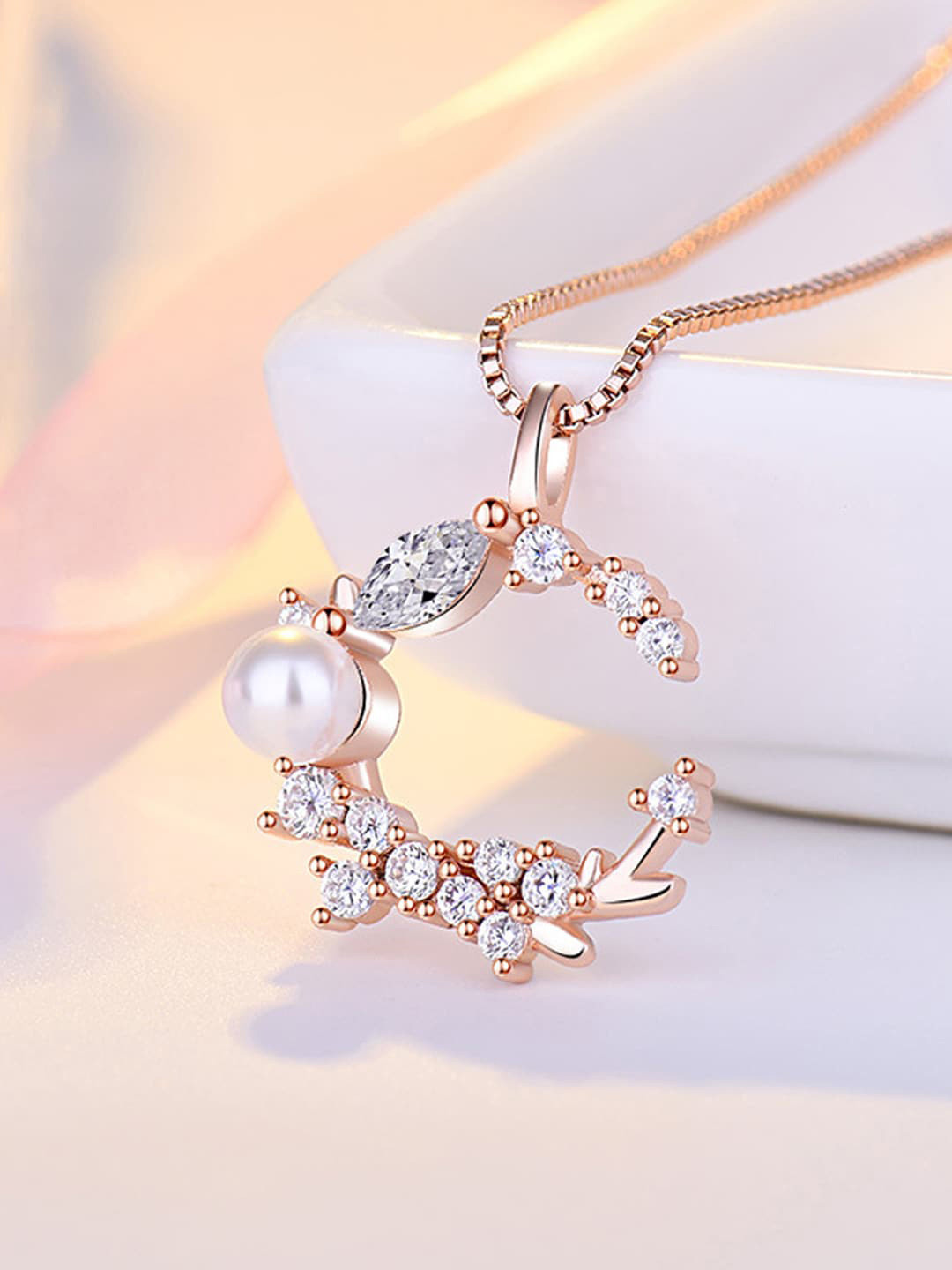Jewels Galaxy Rose Gold-Plated AD-Studded Half Moon-shaped Pendant With Chain